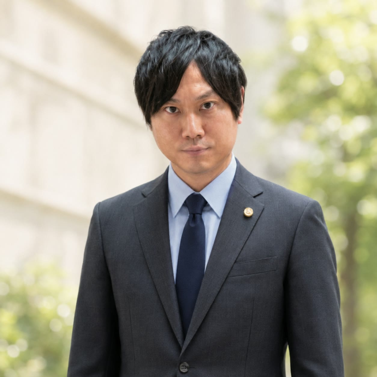 竹岡 裕介（Chief Legal Officer）のポートレート